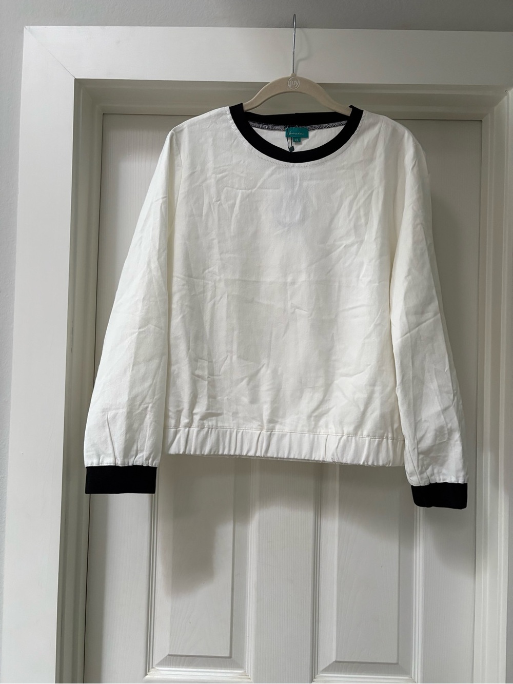 Classic White Crewneck Top with Black Trim